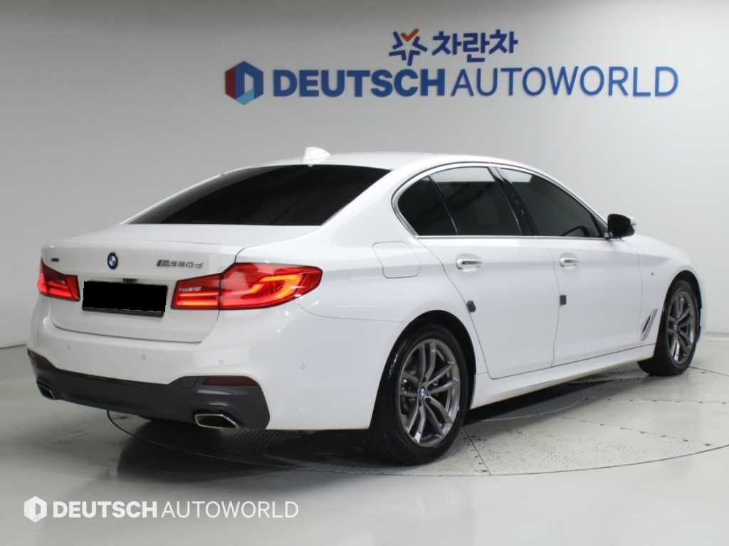 BMW 5-Series — photo 02