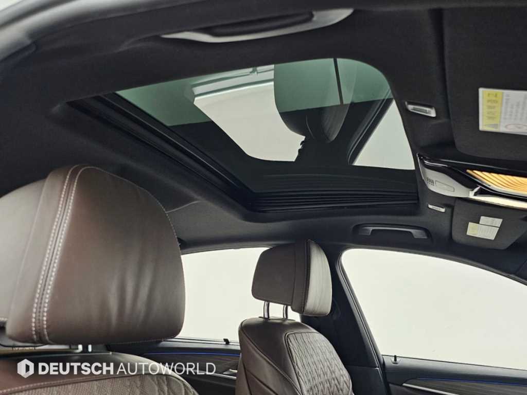 BMW 5-Series — photo 18