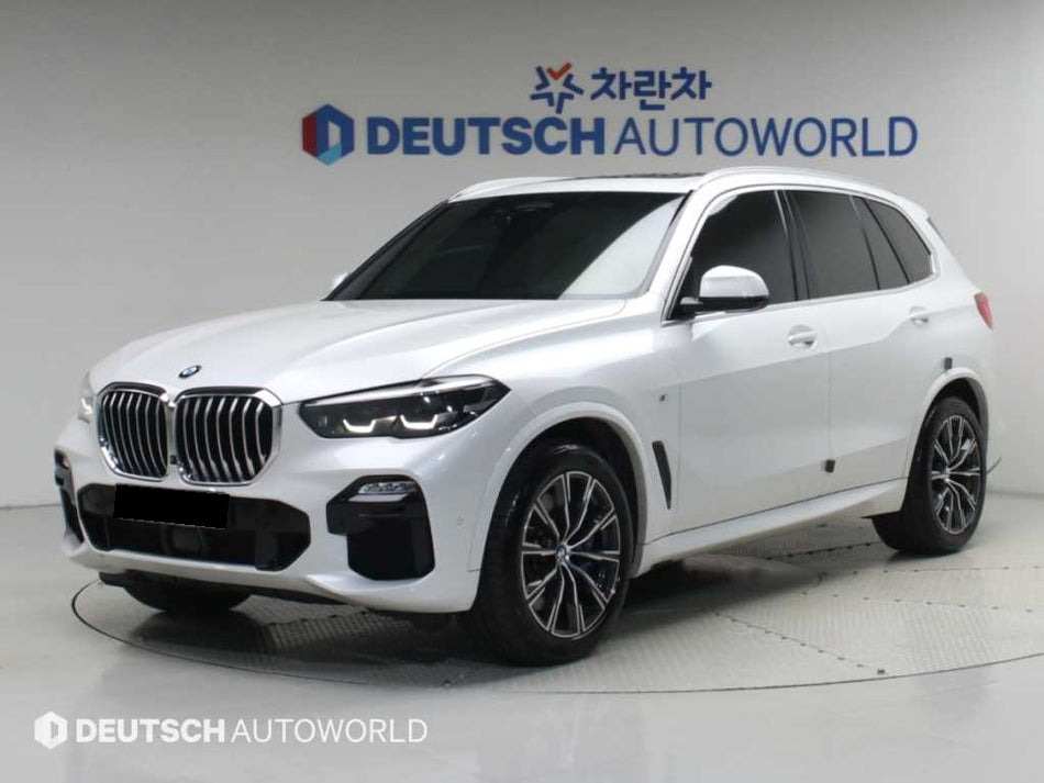 BMW X5 — photo 01