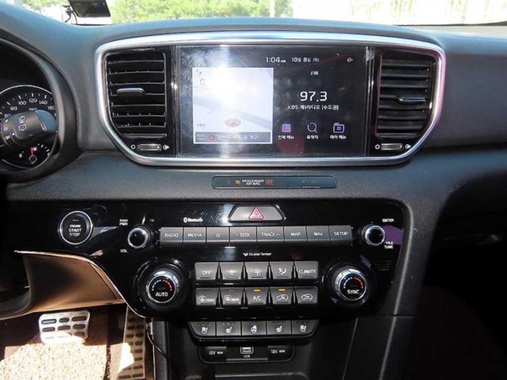 Kia Sportage — photo 14
