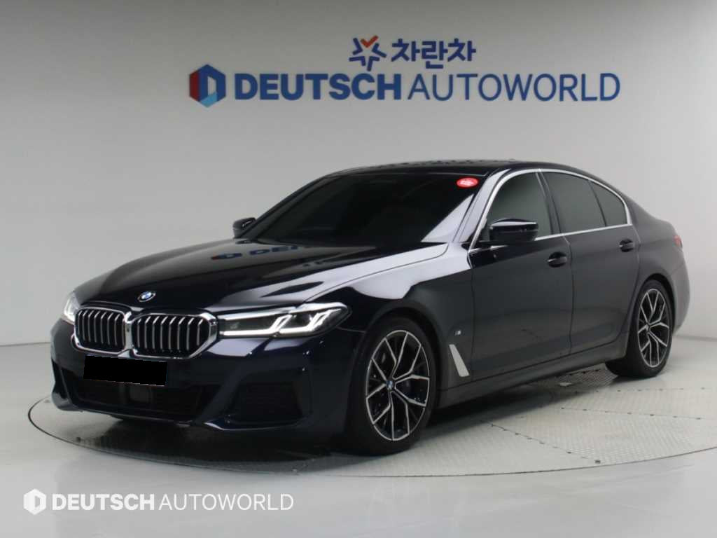 BMW 5-Series — photo 01