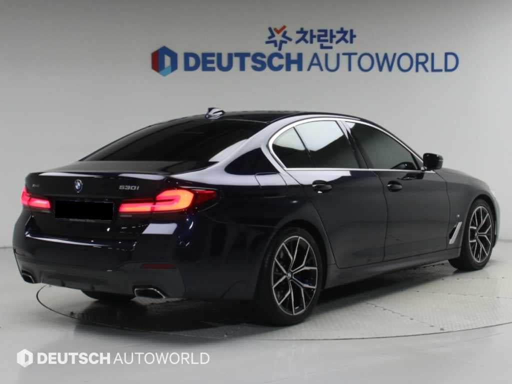 BMW 5-Series — photo 02