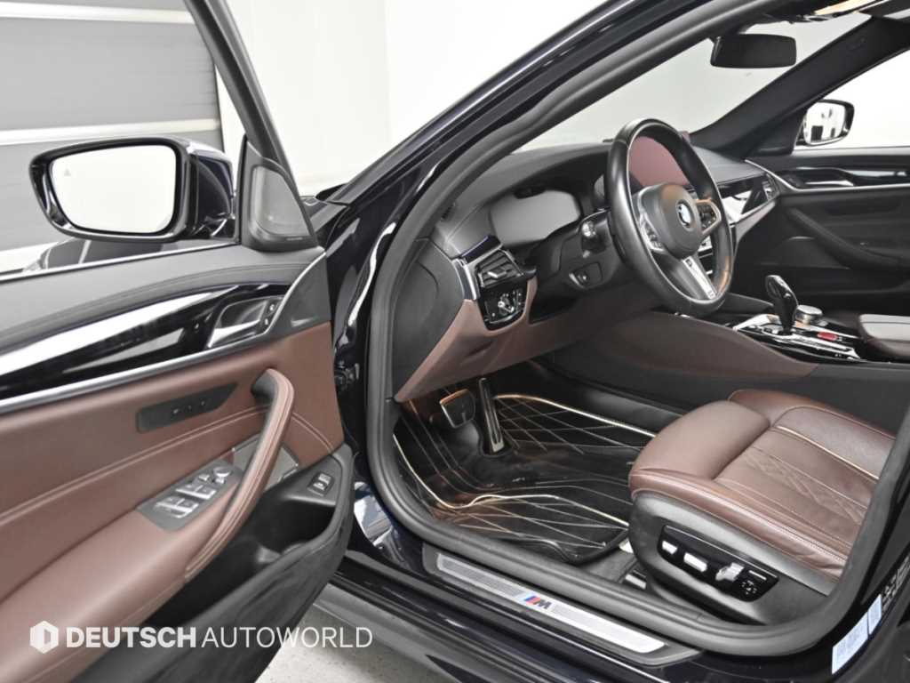 BMW 5-Series — photo 11