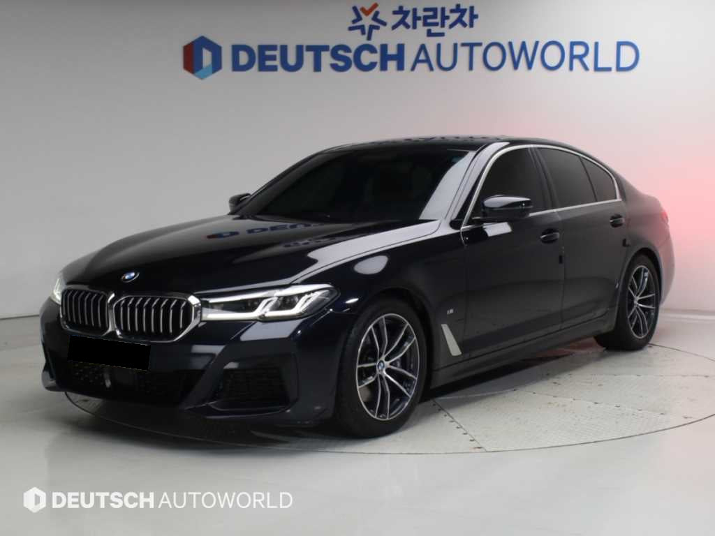 BMW 5-Series — photo 01