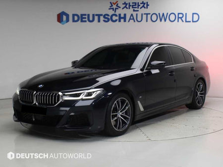 BMW 5-Series — photo 01