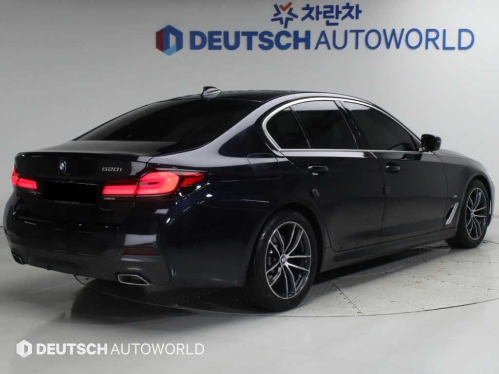 BMW 5-Series — photo 02