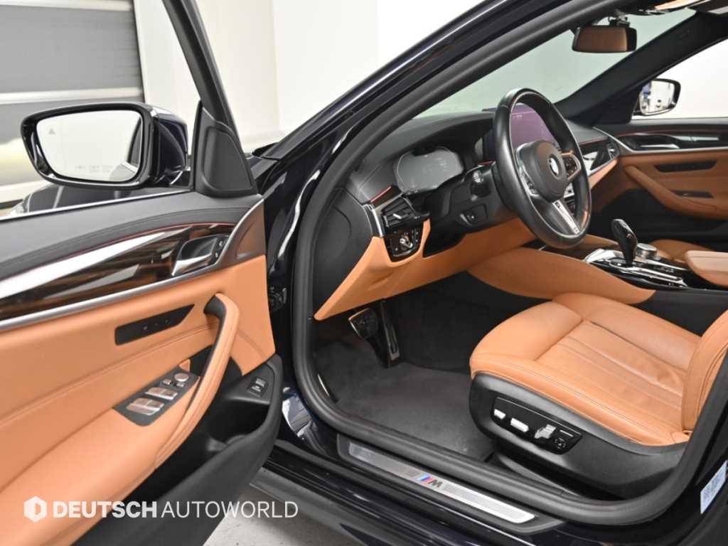 BMW 5-Series — photo 10