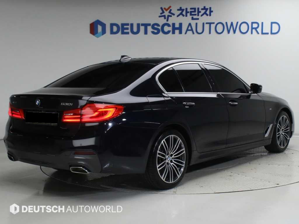 BMW 5-Series — photo 02