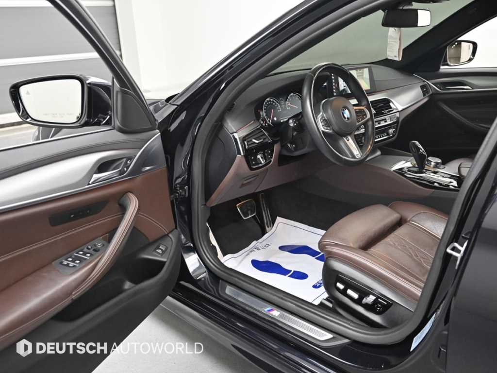 BMW 5-Series — photo 11