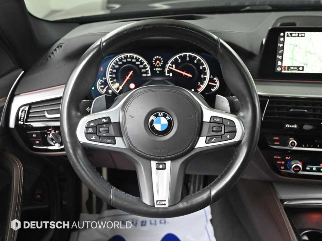 BMW 5-Series — photo 13