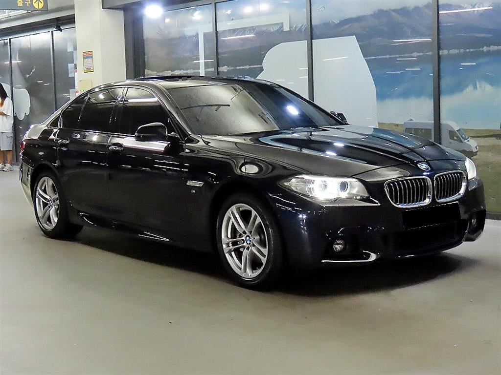 BMW 5-Series — photo 01