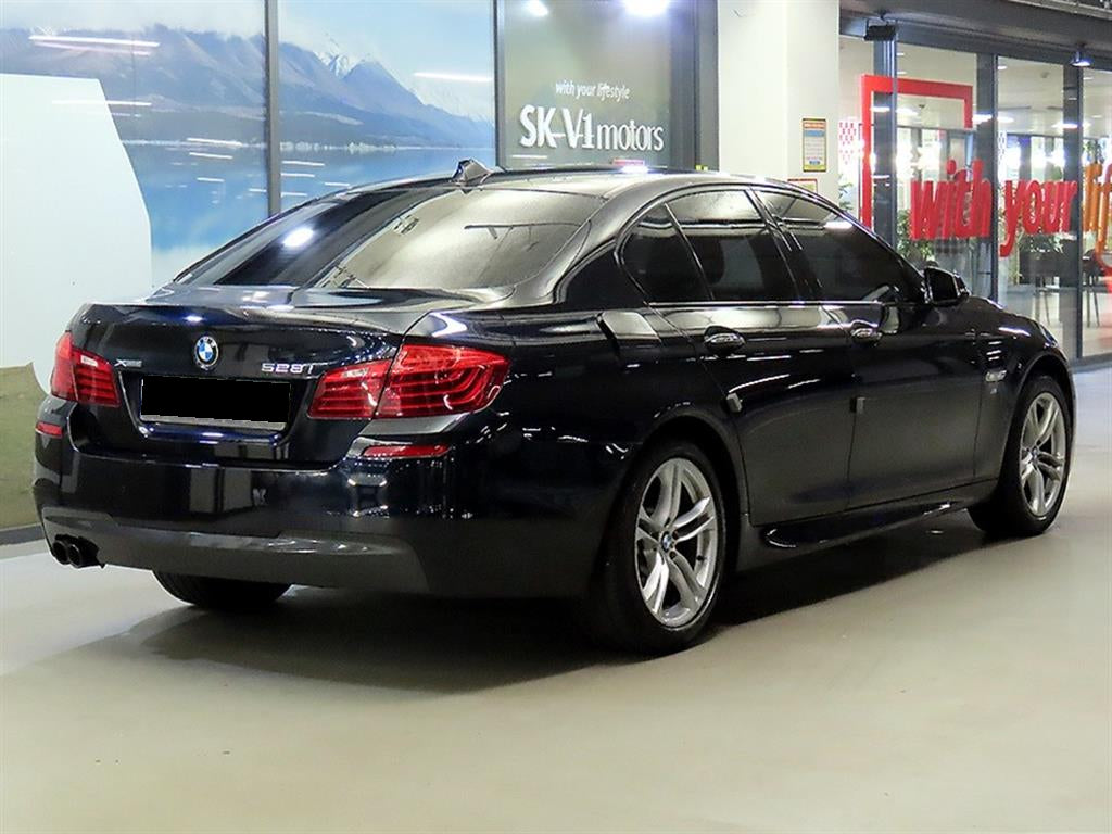 BMW 5-Series — photo 04