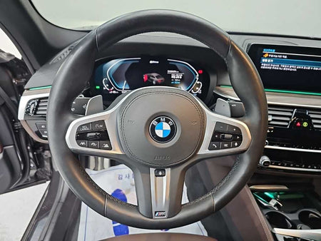 BMW 5-Series — photo 09