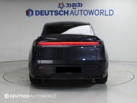 Tesla Model Y — photo 04
