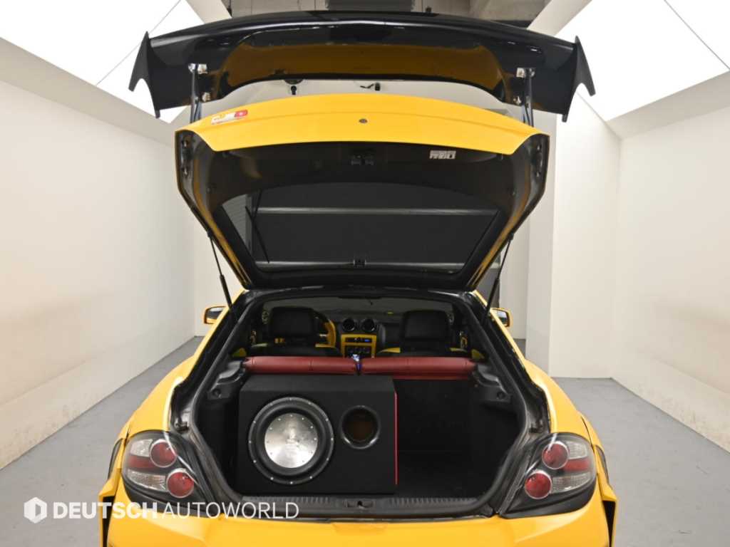 Hyundai Tuscani — photo 19