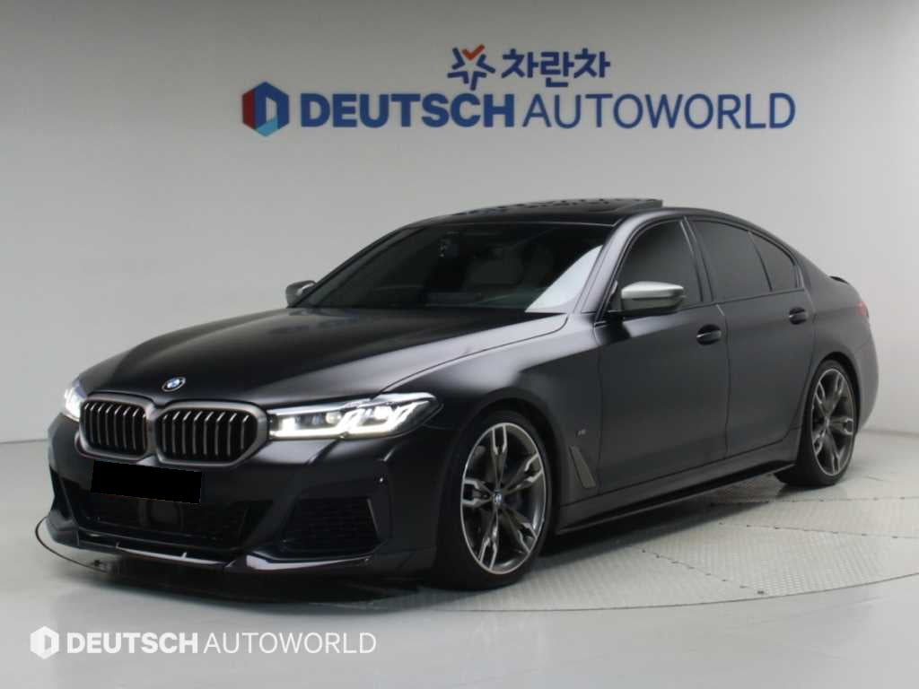 BMW 5-Series — photo 01