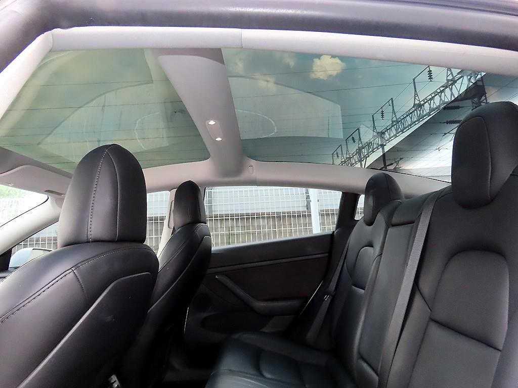 Tesla Model 3 — photo 17
