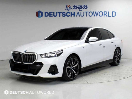 BMW 5-Series — photo 01