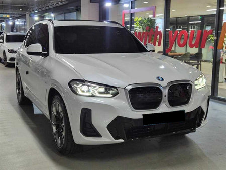 BMW iX3 — photo 01