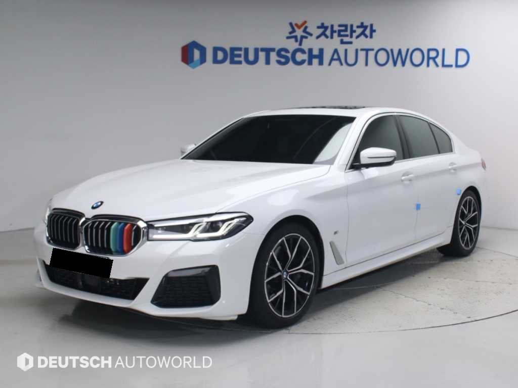 BMW 5-Series — photo 01