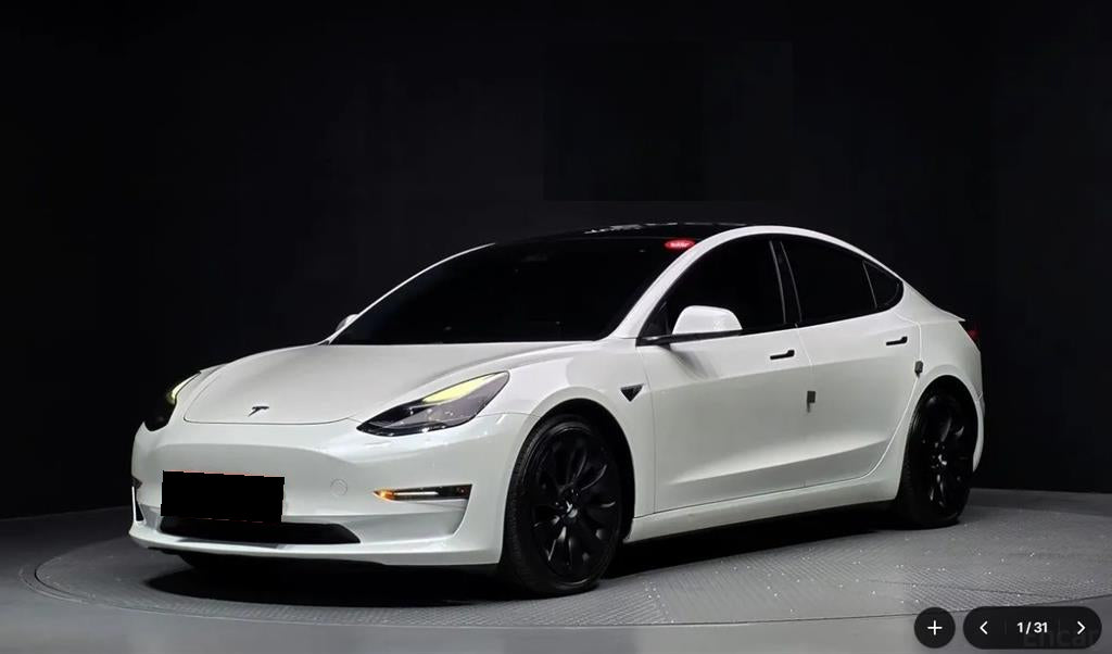 Tesla Model 3 — photo 01