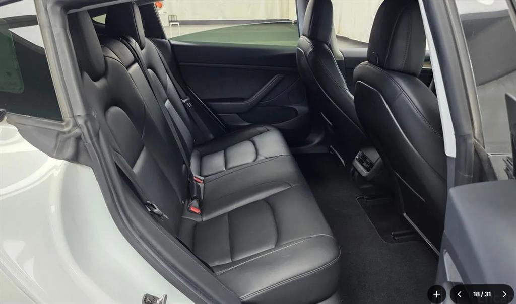 Tesla Model 3 — photo 11