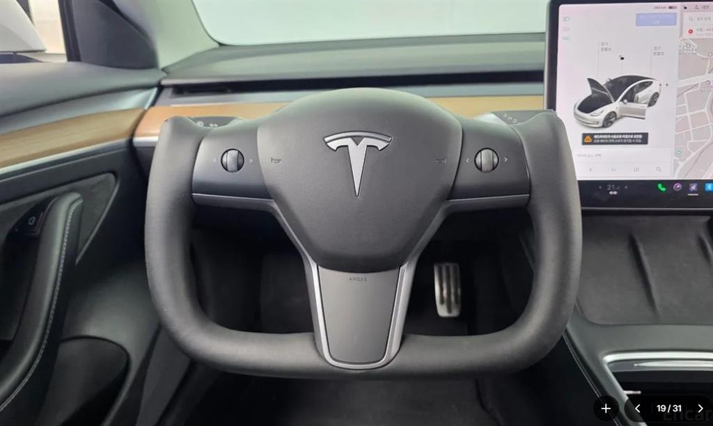 Tesla Model 3 — photo 12