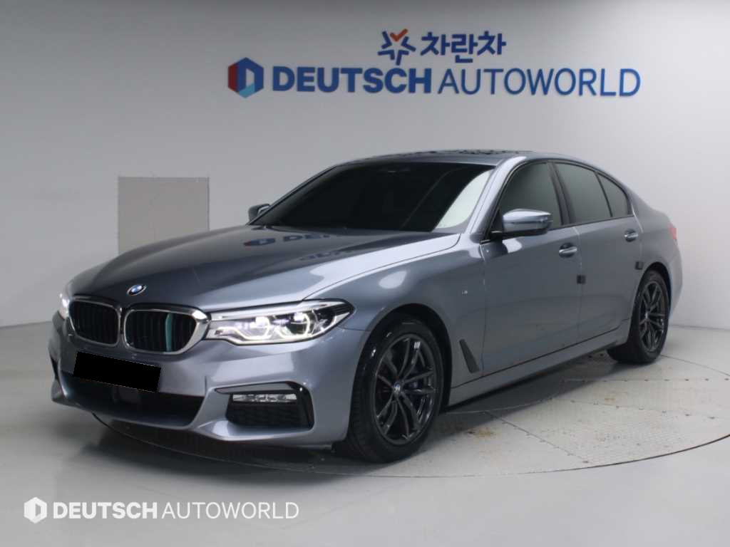 BMW 5-Series — photo 01