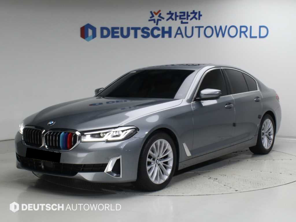 BMW 5-Series — photo 01