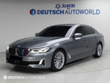 BMW 5-Series — photo 01