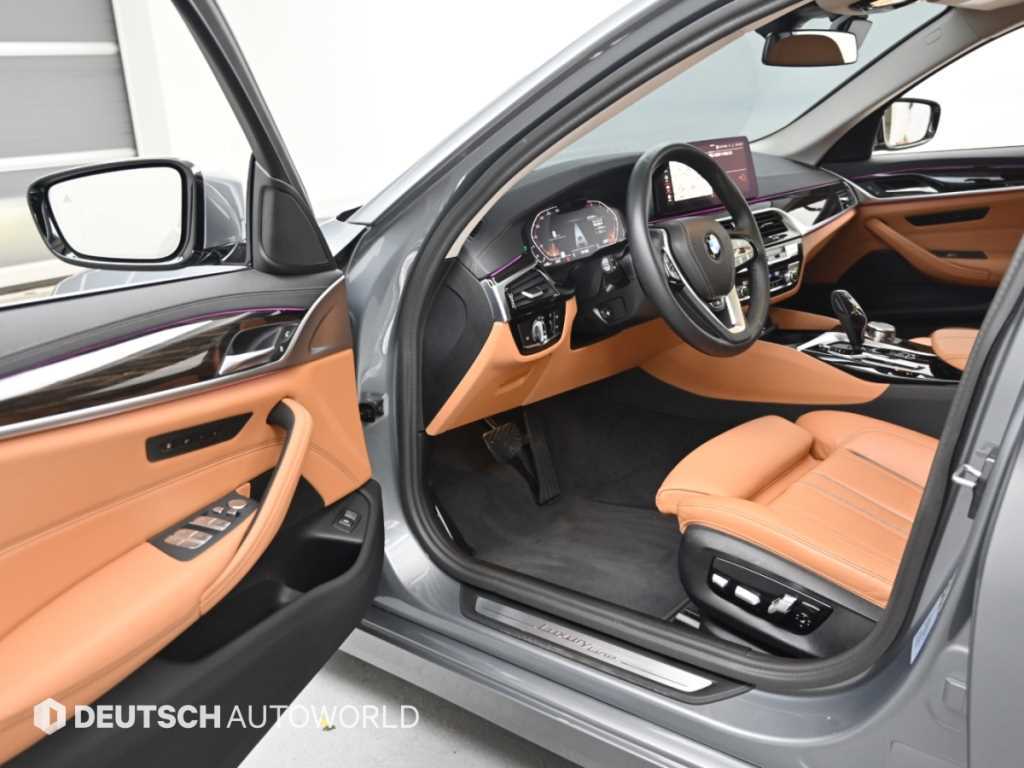 BMW 5-Series — photo 11