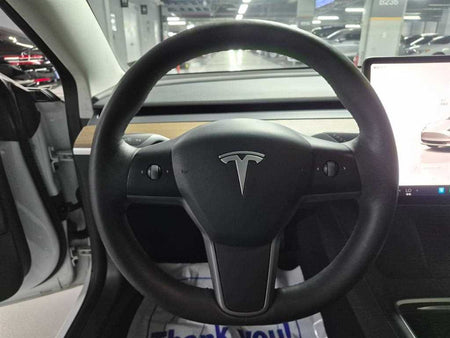 Tesla Model 3 — photo 13
