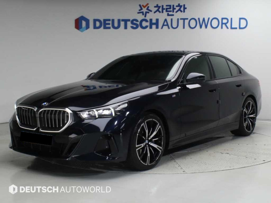 BMW 5-Series — photo 01