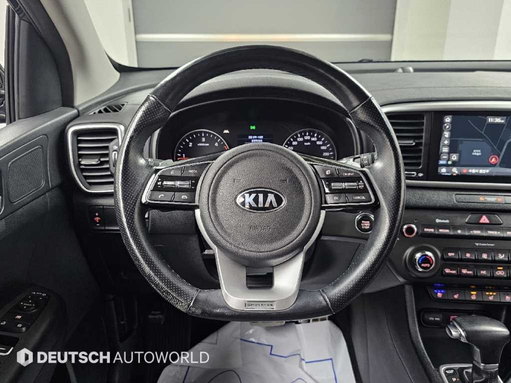 Kia Sportage — photo 13