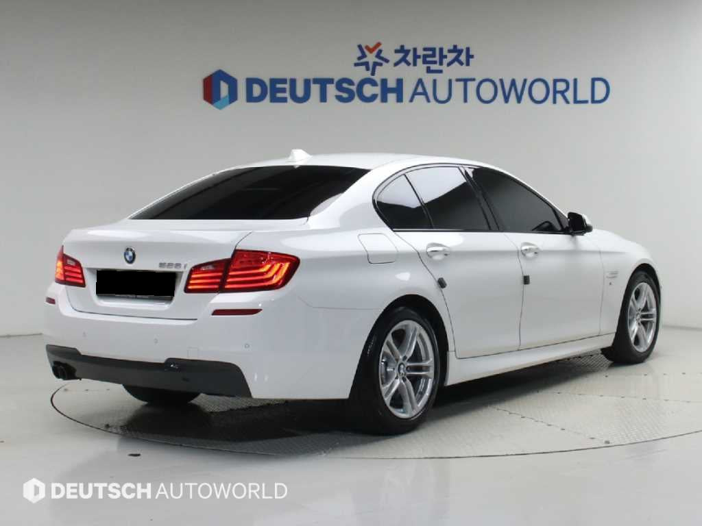 BMW 5-Series — photo 02