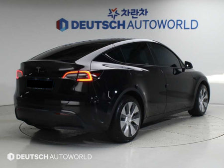 Tesla Model Y — photo 02