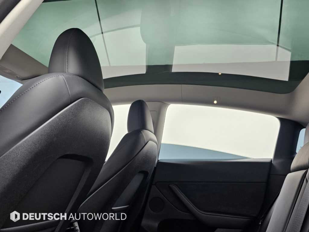 Tesla Model Y — photo 18