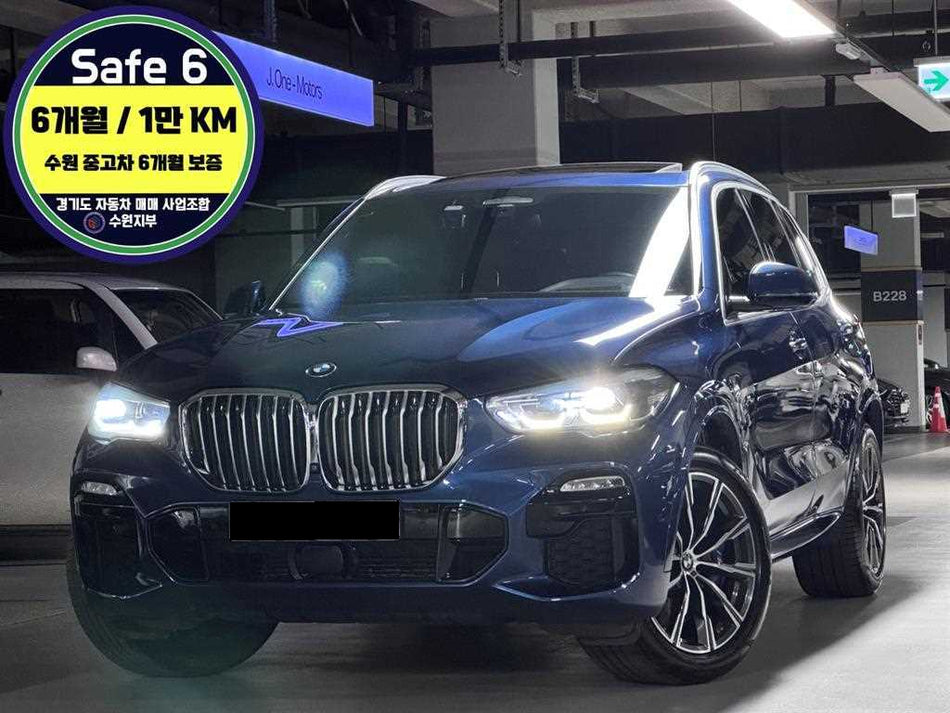 BMW X5 — photo 01