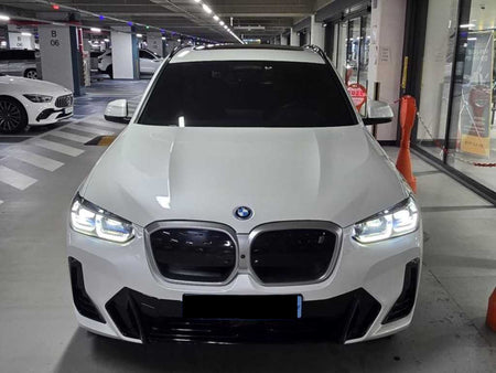 BMW iX3 — photo 01