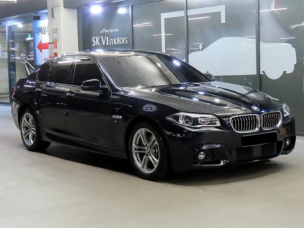 BMW 5-Series — photo 01