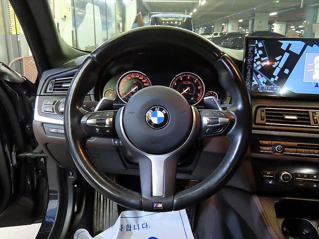 BMW 5-Series — photo 08