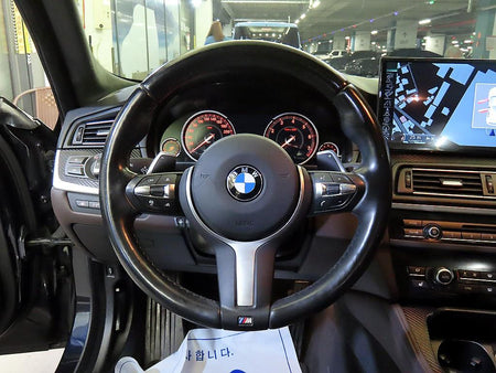 BMW 5-Series — photo 08